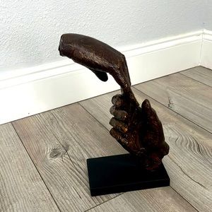 Floating hands sculpture